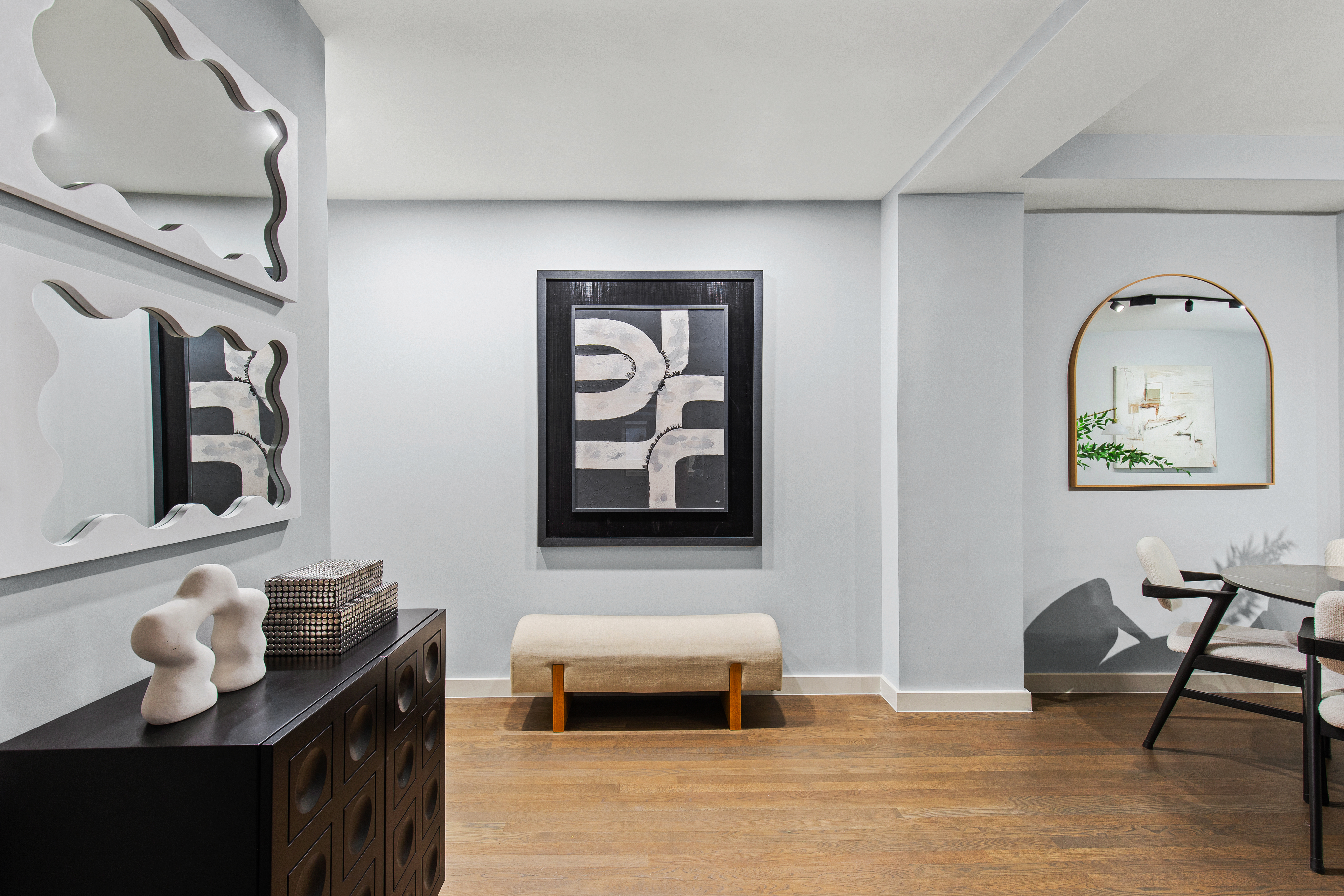 Entry — sculptural mirrors, art wall